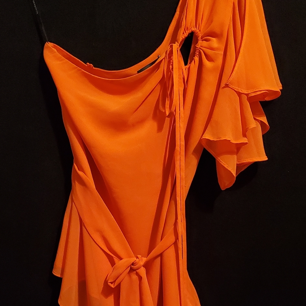 Super sexy and feminine NWT Bebe blouse